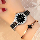 Elegant female wrist watches featuring a black dial and sparkling crystals, paired with a stylish bracelet on a delicate wrist