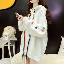 Korean style stitching button blouse featuring a drawstring hood, colorful buttons, and a comfy oversized design