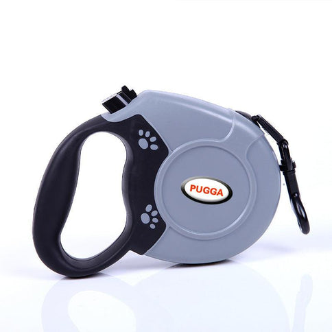 Compact gray retractable dog leash featuring a comfortable grip and durable clip, perfect for walking dogs