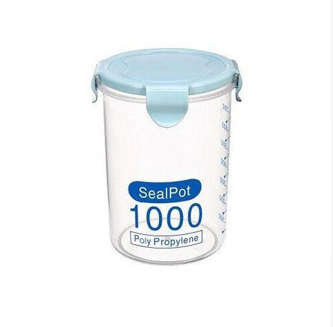 Transparent sealed plastic food storage container with a blue lid and measurement markings, ideal for household use