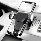 Universal gravity phone mount in sleek design, securely holding smartphone in car air vent for hands-free navigation