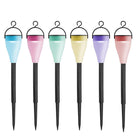 Colorful garden stakes in pastel shades with black poles for outdoor decoration, perfect for adding charm to your garden