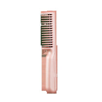 Portable 2 in 1 wireless negative ion hair comb in sleek rose gold for smoothing and styling hair on the go