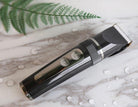 Highfre LCD display USB electric clippers featuring a sleek design and ergonomic handle for precise grooming