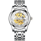 Tevise men's automatic watch with gold accents featuring a skeleton dial and silver stainless steel bracelet for elegant style.