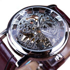 Elegant automatic watches for men featuring an intricate skeleton design with visible gears and a stylish leather strap