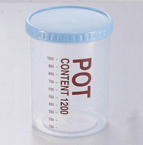 Transparent sealed plastic food storage container with measurement markings, perfect for organizing kitchen essentials