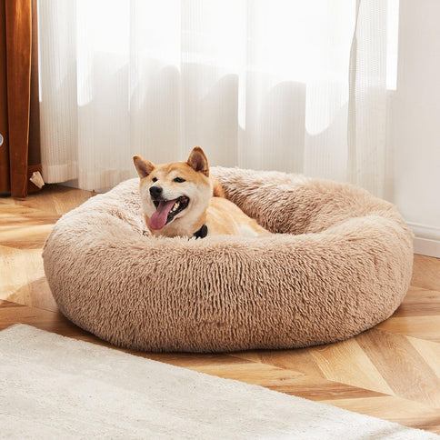 24 inch plush faux fur cat bed in a soft beige design, perfect for pets up to 25 lbs, featuring an anti-slip base