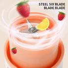 Multi-functional juicer squeezer with steel six blades, designed for making smoothies and juices, featuring strawberries and lemon slices