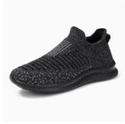 Lightweight black running shoes with a trendy design, perfect for men seeking stylish comfortable running shoes