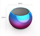 Compact portable Bluetooth speaker with a vibrant blue and purple design, ideal for outdoor use