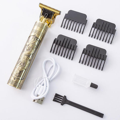 Engraved Oil Head professional electric hair clippers with comb attachments, USB charging cable, and cleaning brush for precise grooming