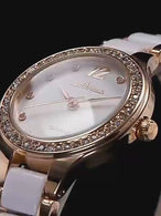 Elegant female wrist watches featuring a rose gold stainless steel case and a sparkling crystal bezel with white leather strap